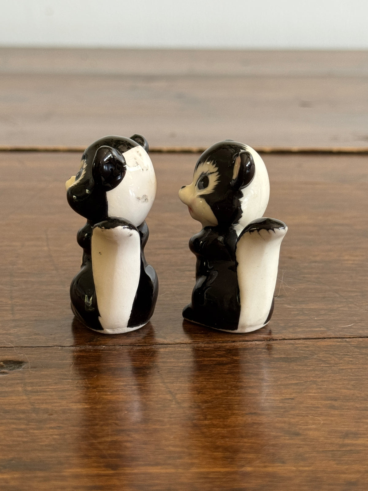 Pair of Vintage Cheery Skunk Figurines - Made in Japan