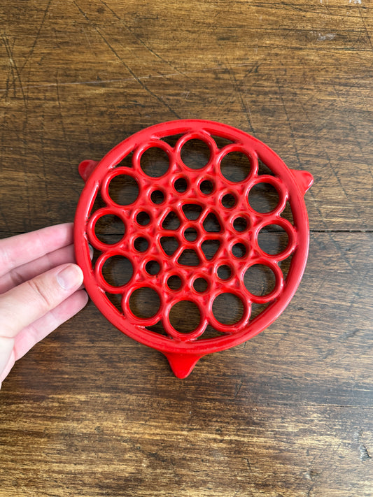 Vintage Red Enamel Cast Iron Trivet