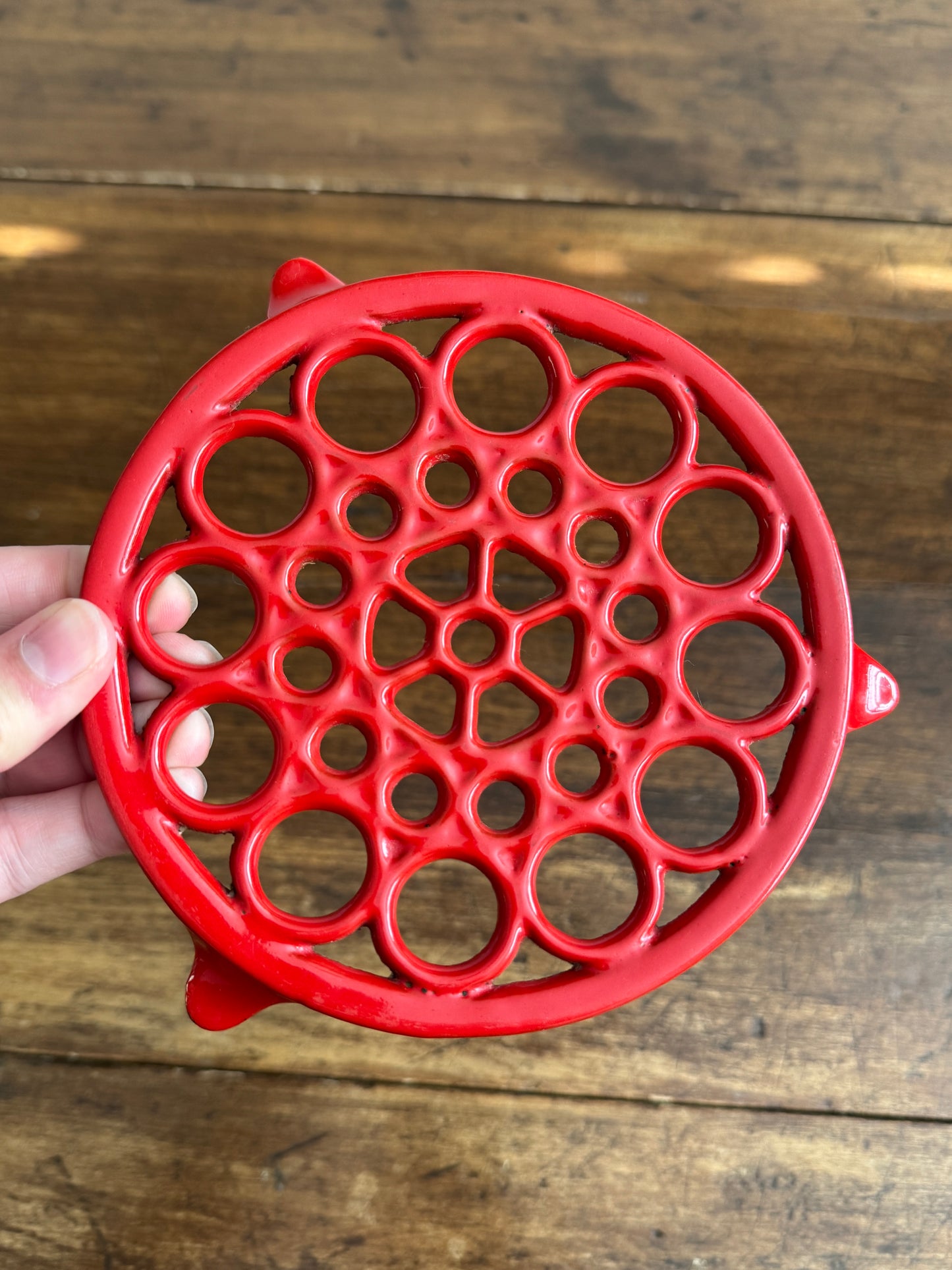 Vintage Red Enamel Cast Iron Trivet