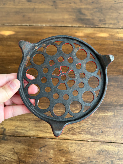 Vintage Red Enamel Cast Iron Trivet