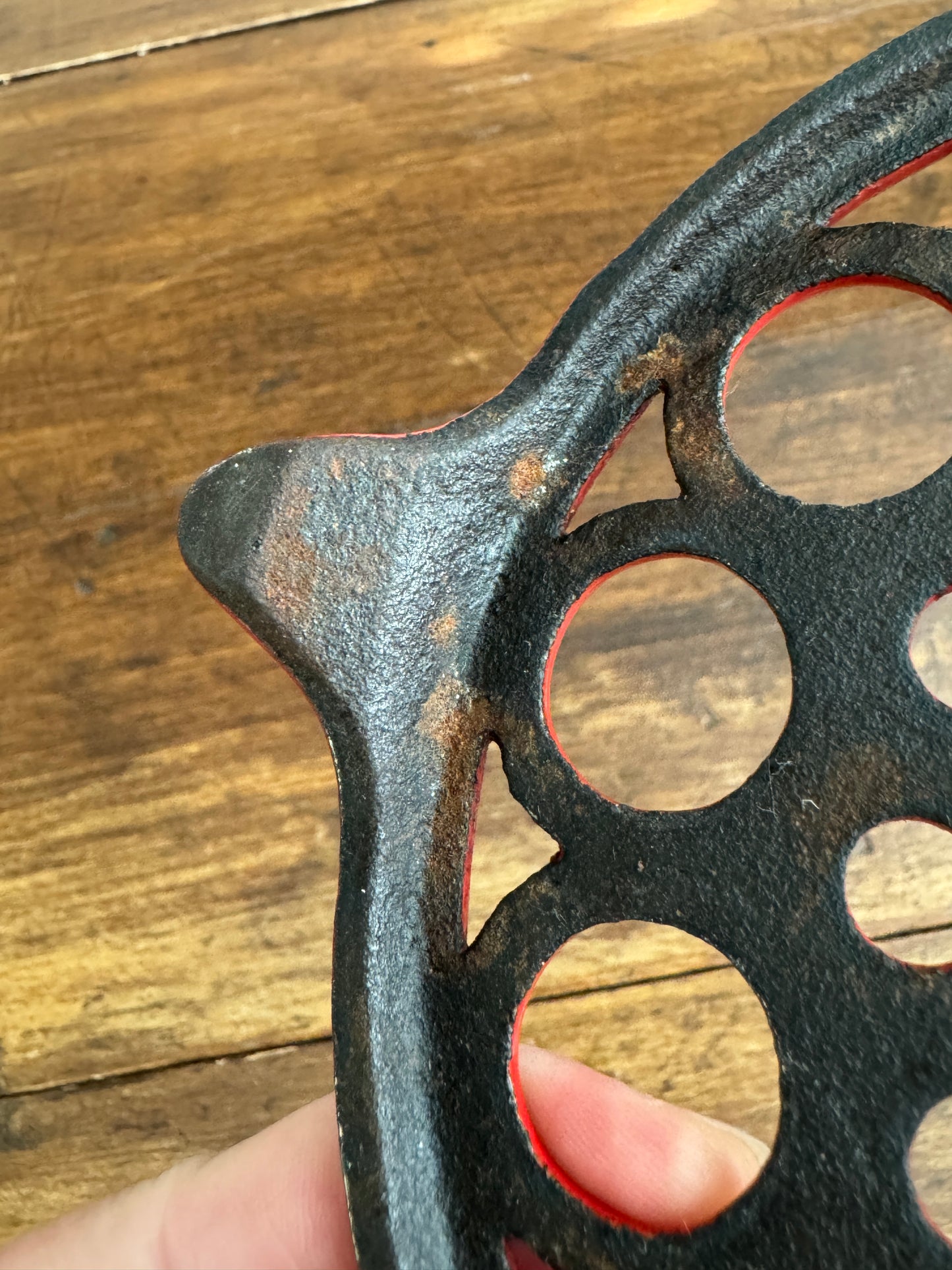 Vintage Red Enamel Cast Iron Trivet