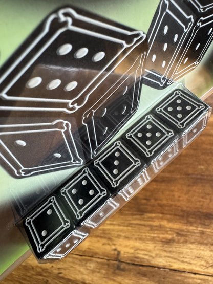 Spooky Math Dice Game with Black Dice Showing Skull Symbol