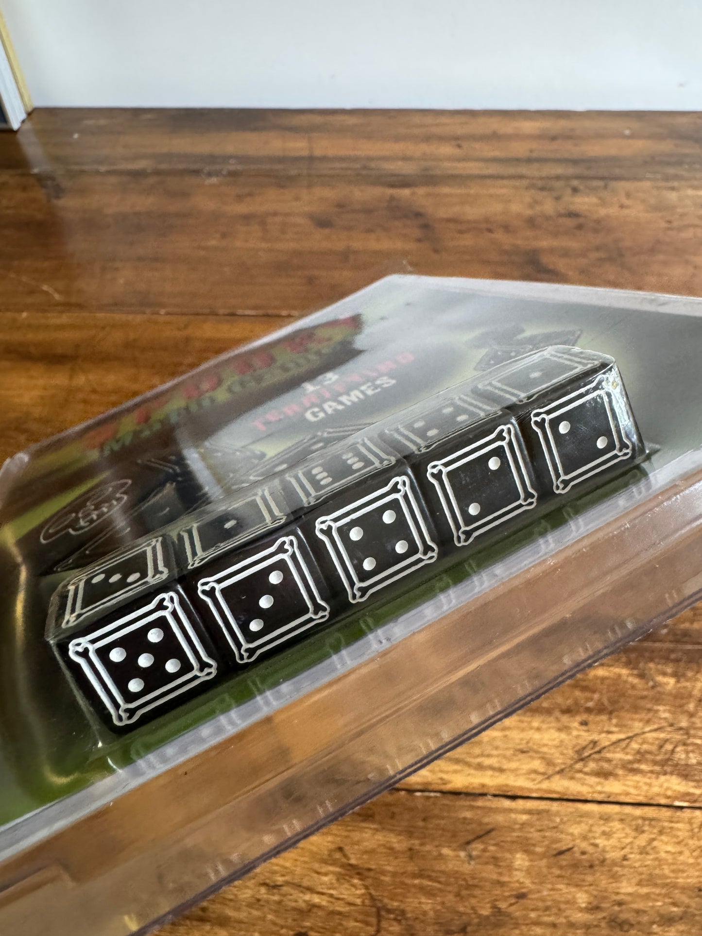 Spooky Math Dice Game with Black Dice Showing Skull Symbol