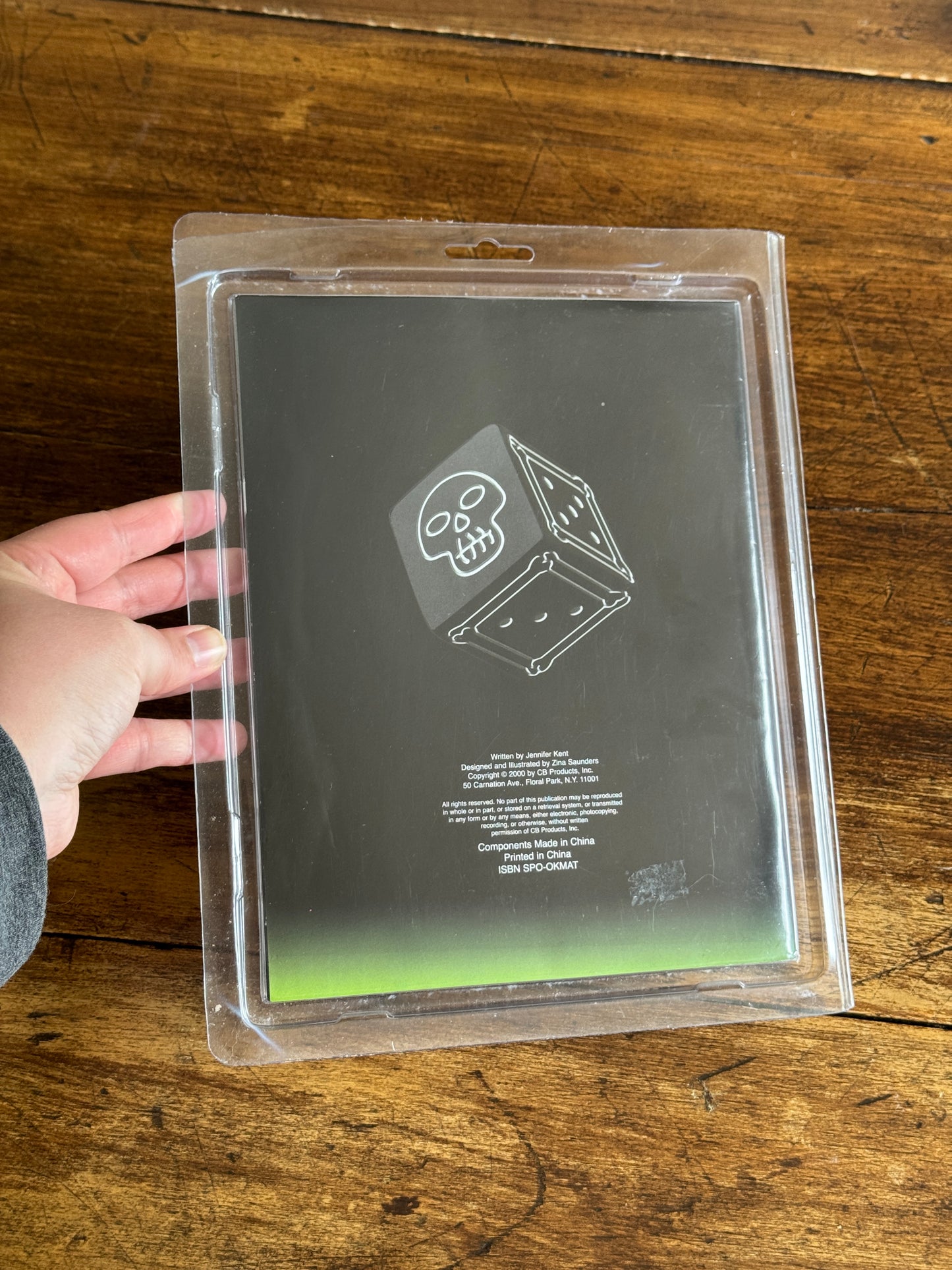 Spooky Math Dice Game with Black Dice Showing Skull Symbol