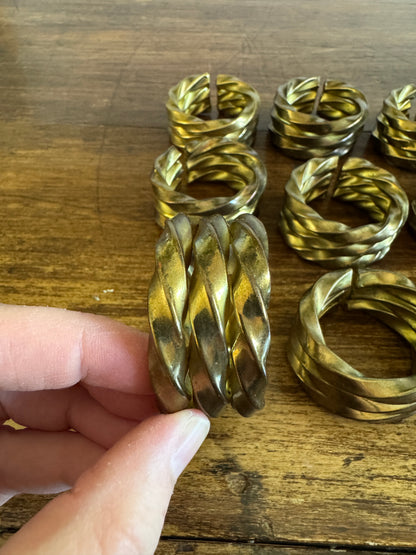 Set of Nine Brass Twisted Metal Napkin Rings