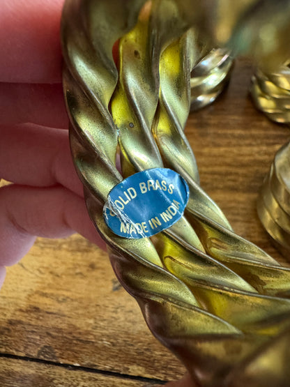 Set of Nine Brass Twisted Metal Napkin Rings