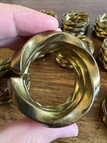 Set of Nine Brass Twisted Metal Napkin Rings