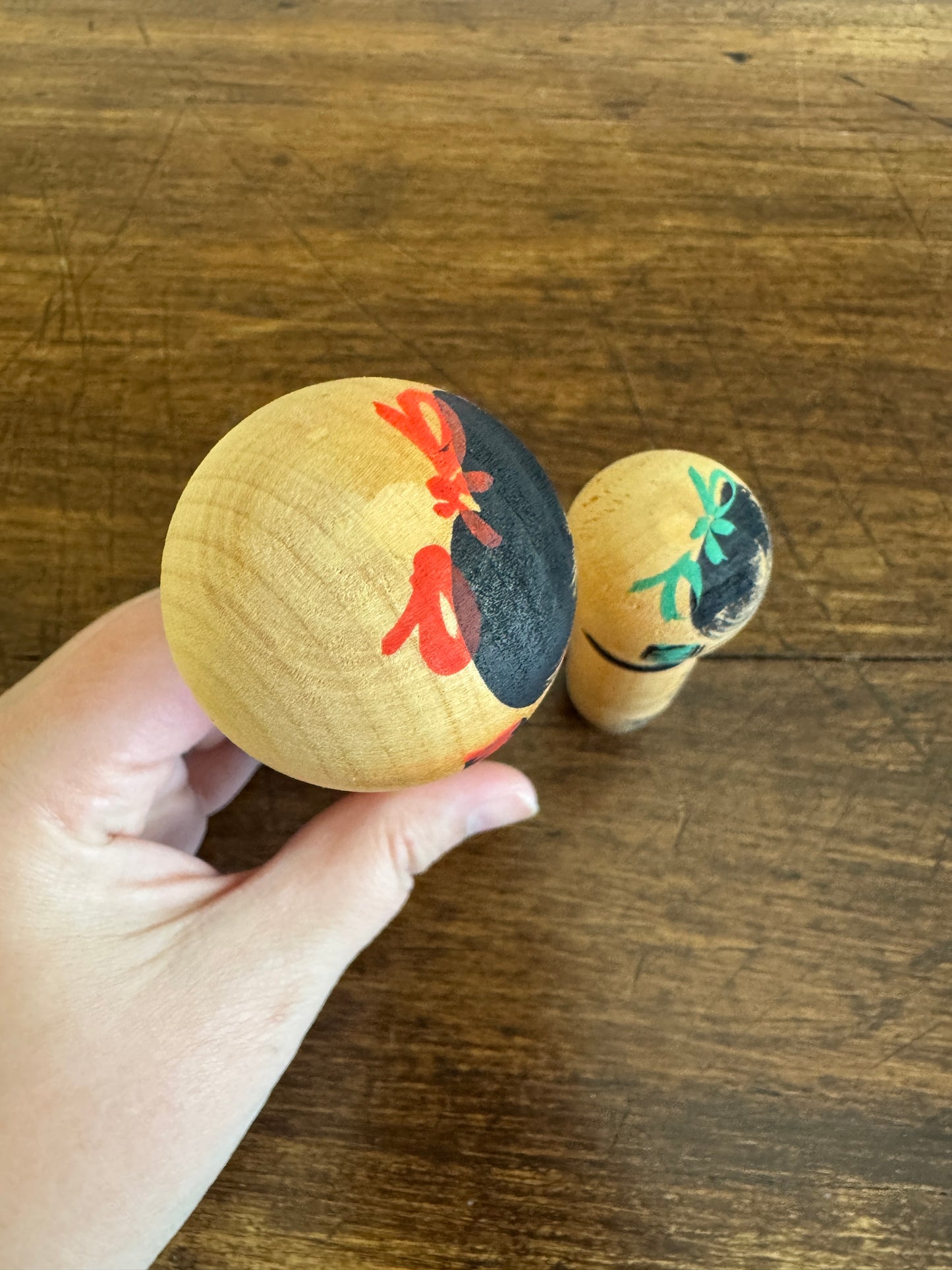 Vintage Pair of Japanese Kokeshi Dolls with Scenic Bodies and Calligraphy