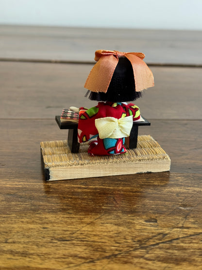 Vintage Japanese Mixed Media Kokeshi Doll on Mat in Learning Environment
