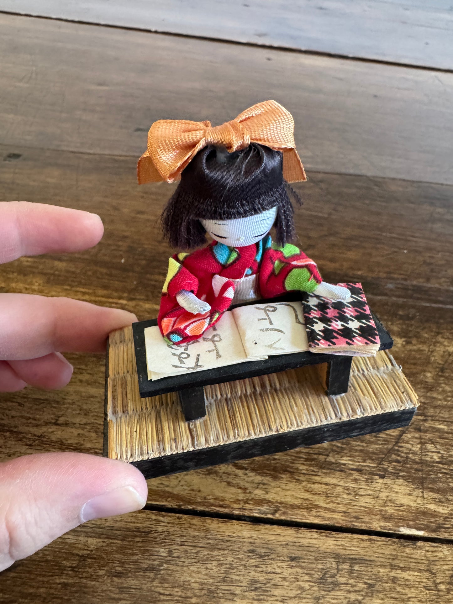 Vintage Japanese Mixed Media Kokeshi Doll on Mat in Learning Environment