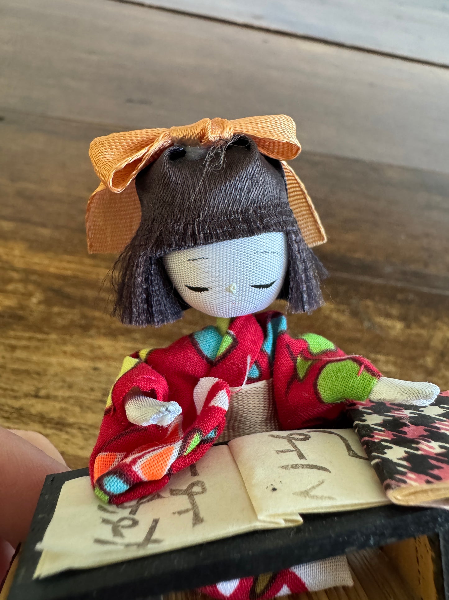 Vintage Japanese Mixed Media Kokeshi Doll on Mat in Learning Environment